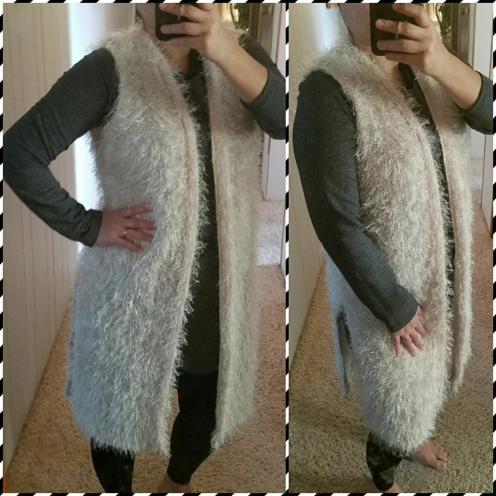 Soft fuzzy duster vest/cardigan.